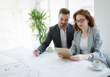 portrait-of-young-architect-woman-on-meeting-KFZCE3A